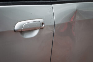 Paintless Dent Removal vs Traditional Dent Repair